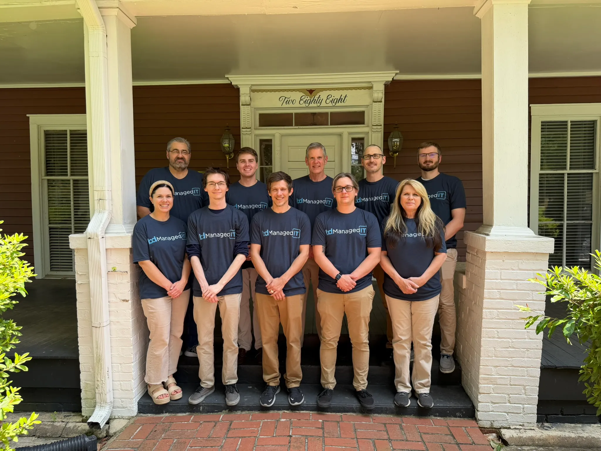 The bdManagedIT team on the porch at our Madison office, 288 S. Main St.